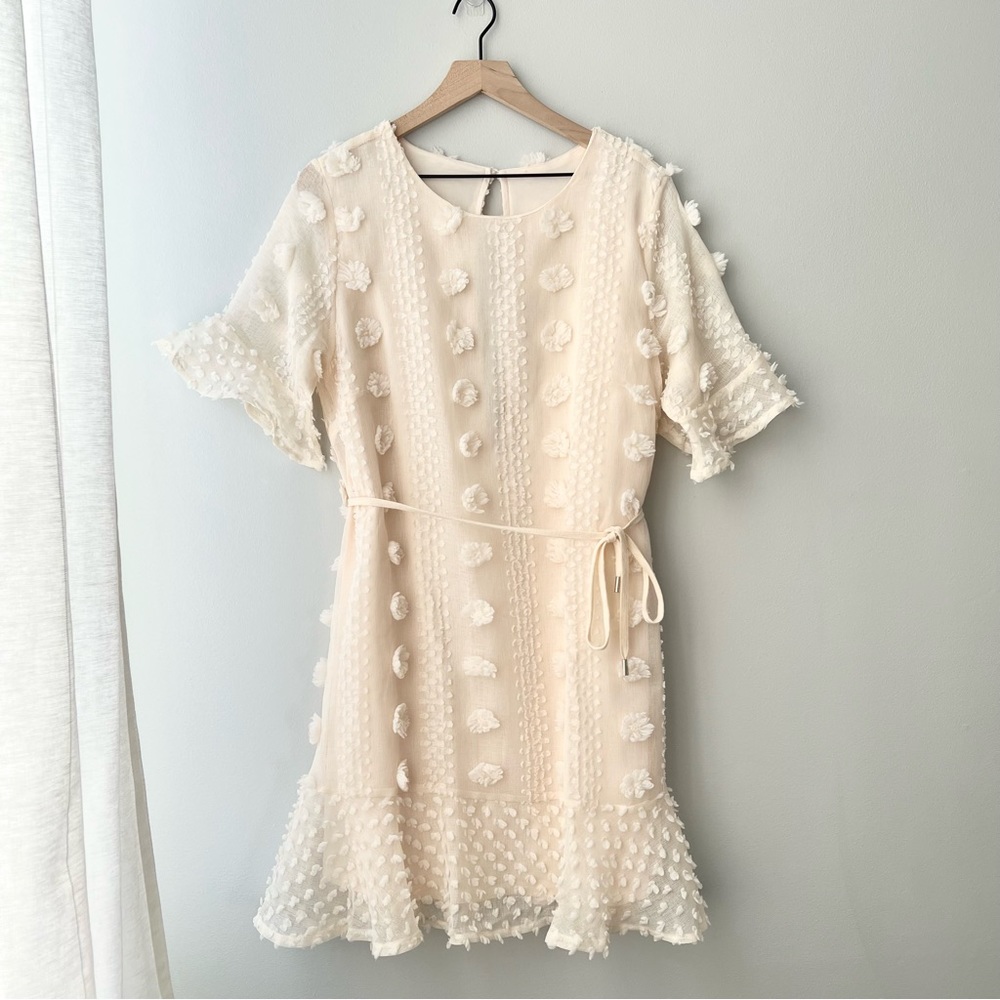 MALENY EMBELLISHED FLUTED HEM DRESS BEIGE